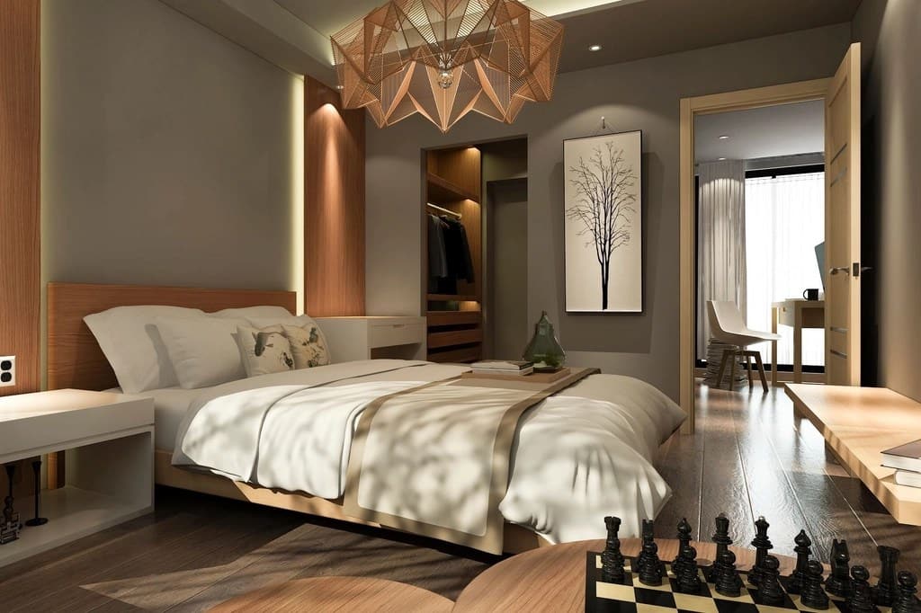 Warm, softly lit bedroom designed by the studio